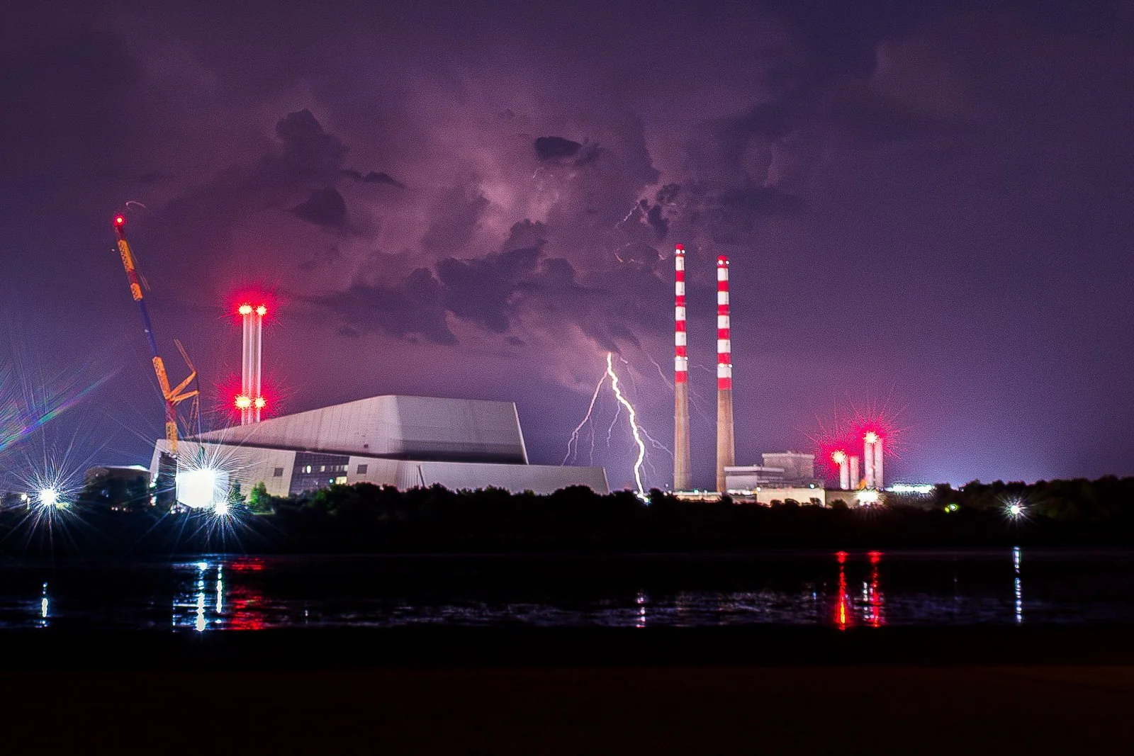 2026-05-28 Poolbeg lightning distant thunderstorm from Sandymount.jpg