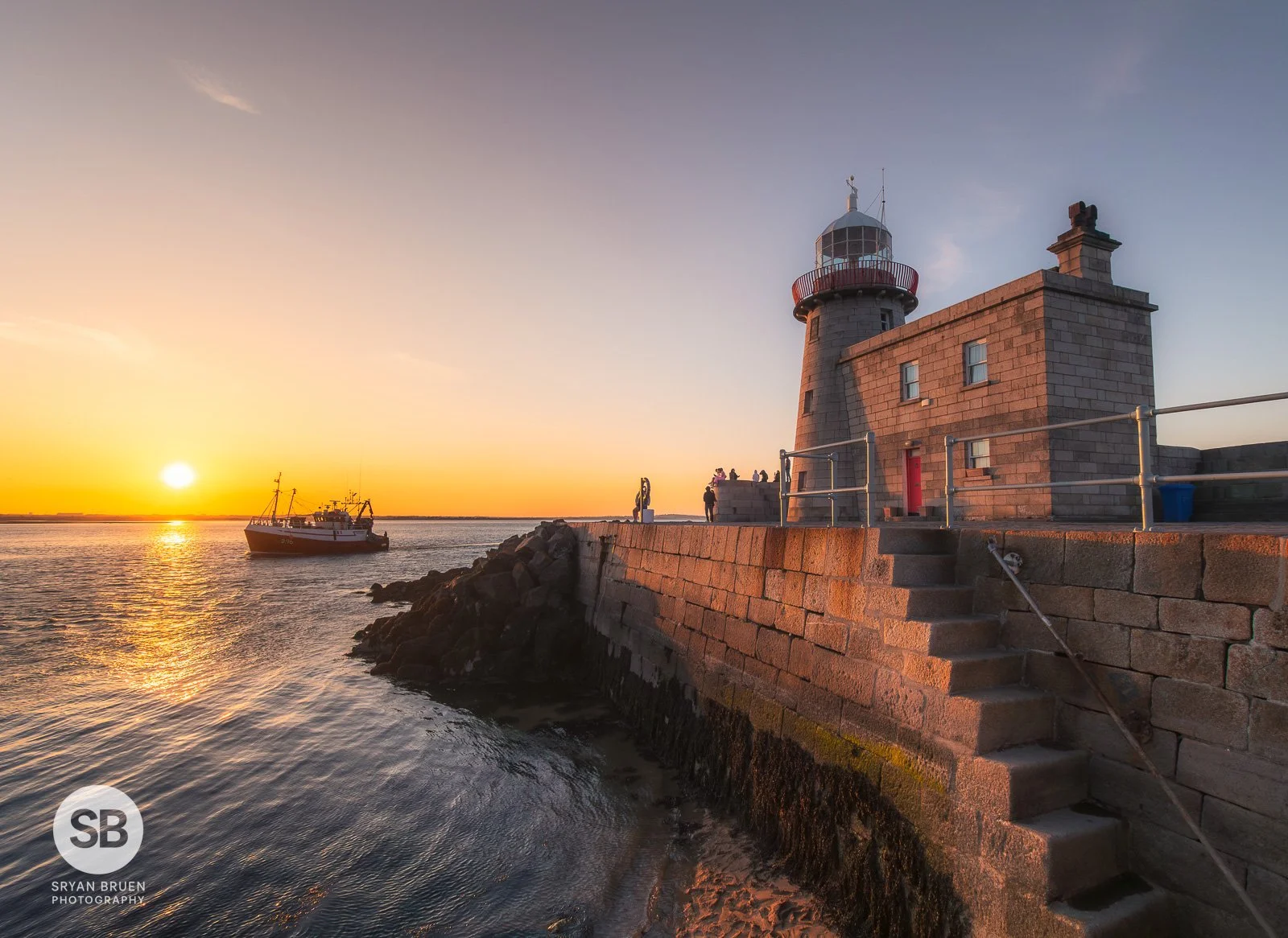 2025-04-11 Howth Lighthouse wide angle sunset boat 11 April 2025.jpg