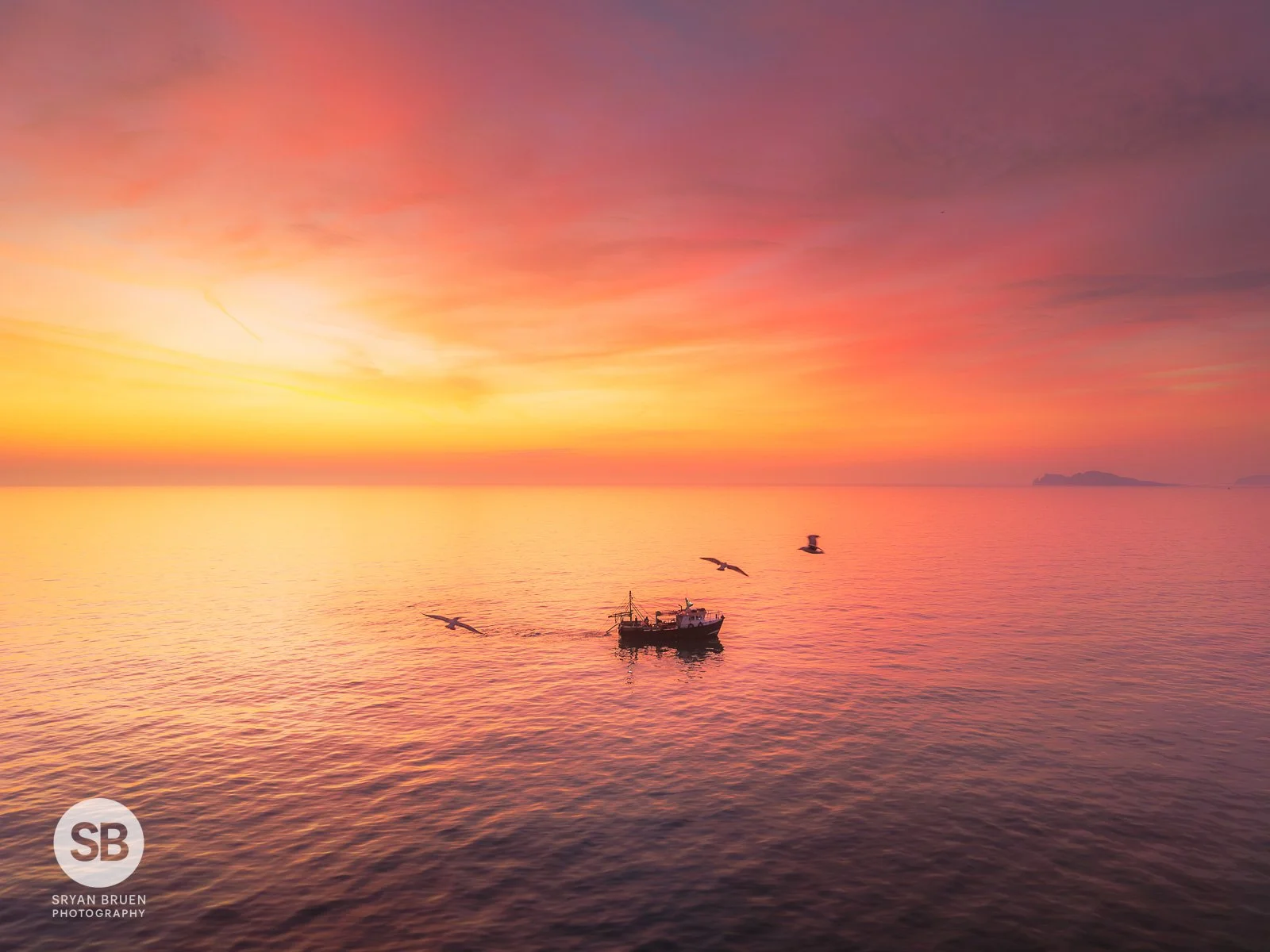 2025-03-20 Portmarnock trawler sunrise sky birds 20 March 2025.jpg