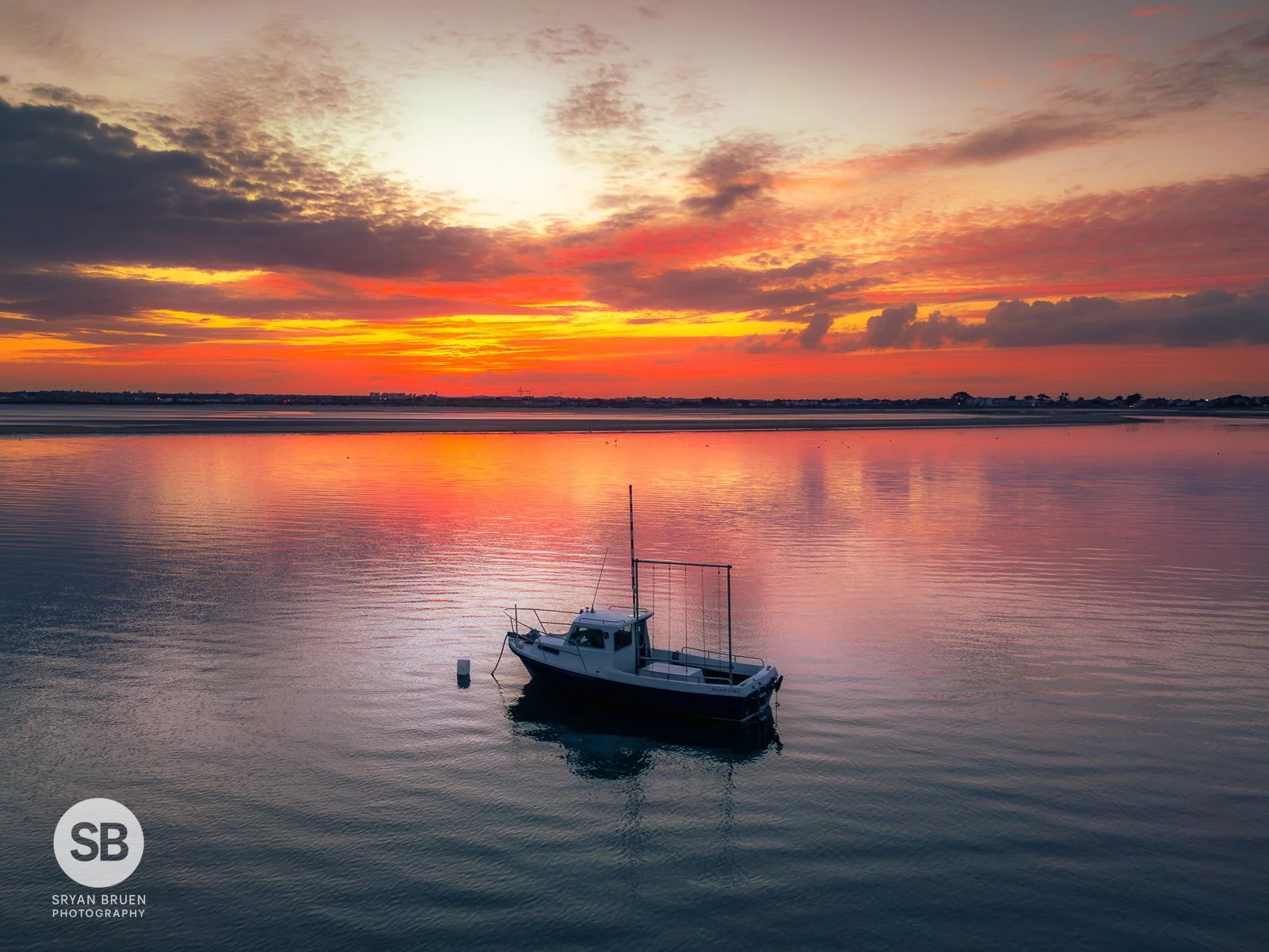 2024-08-09 Sutton Strand boat red sky sunset 9 August 2024.jpg