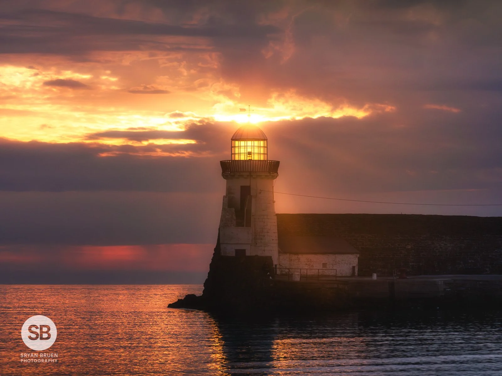 2026-04-26 Balbriggan Lighthouse cloudy sunrise light.jpg