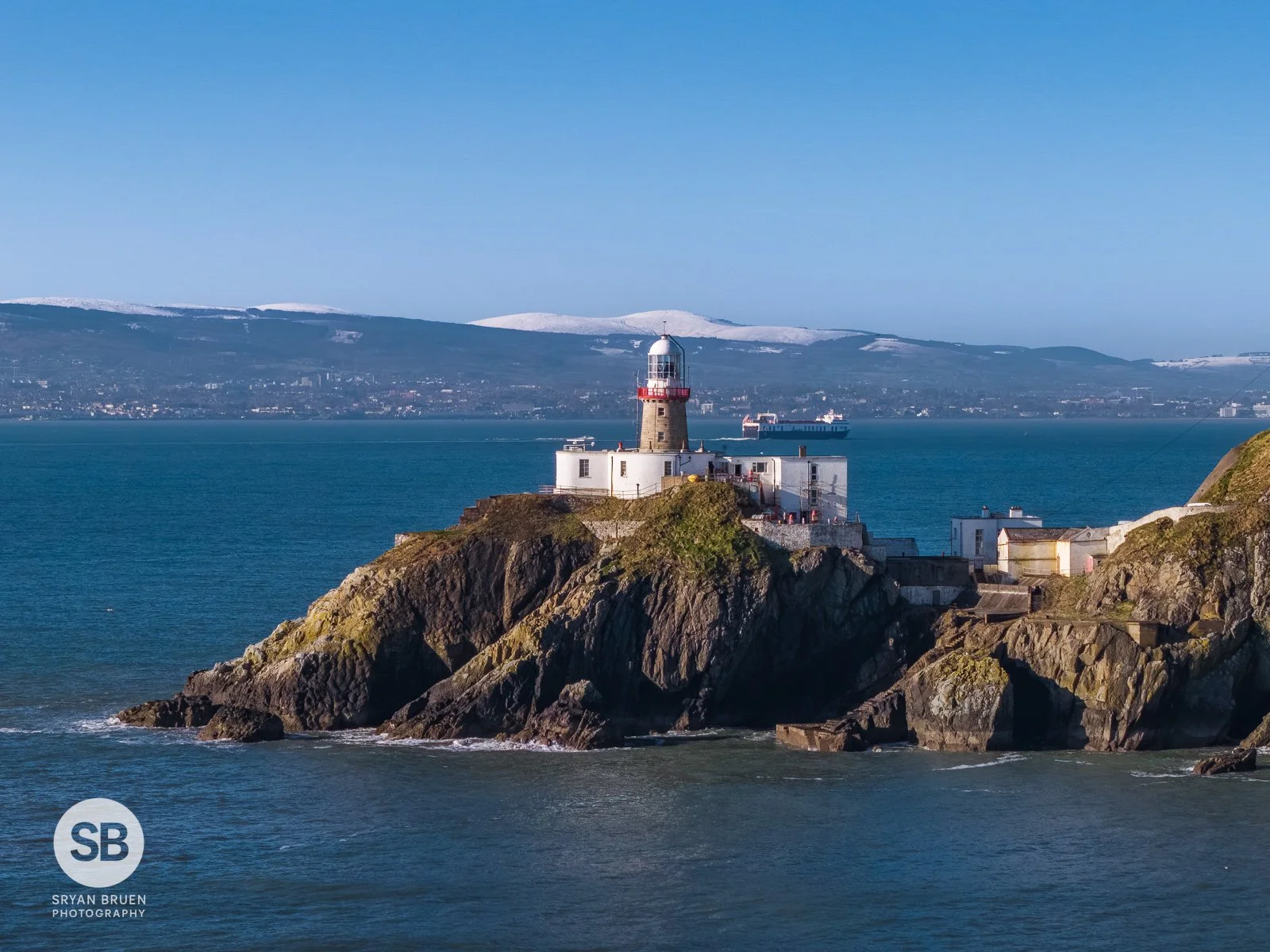2026-03-06 Baily Lighthouse snow capped Wicklow Mountains.jpg