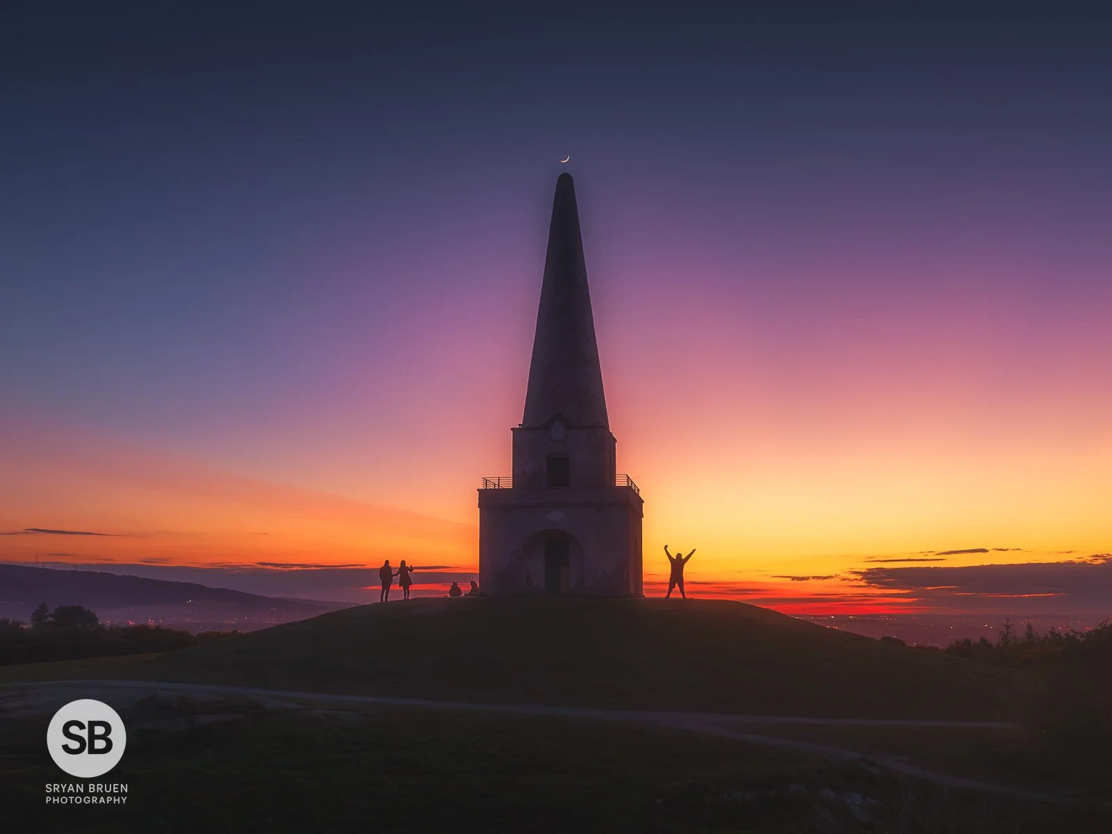 2026-04-19 Killiney Hill obelisk crescent moon sunset afterglow.jpg
