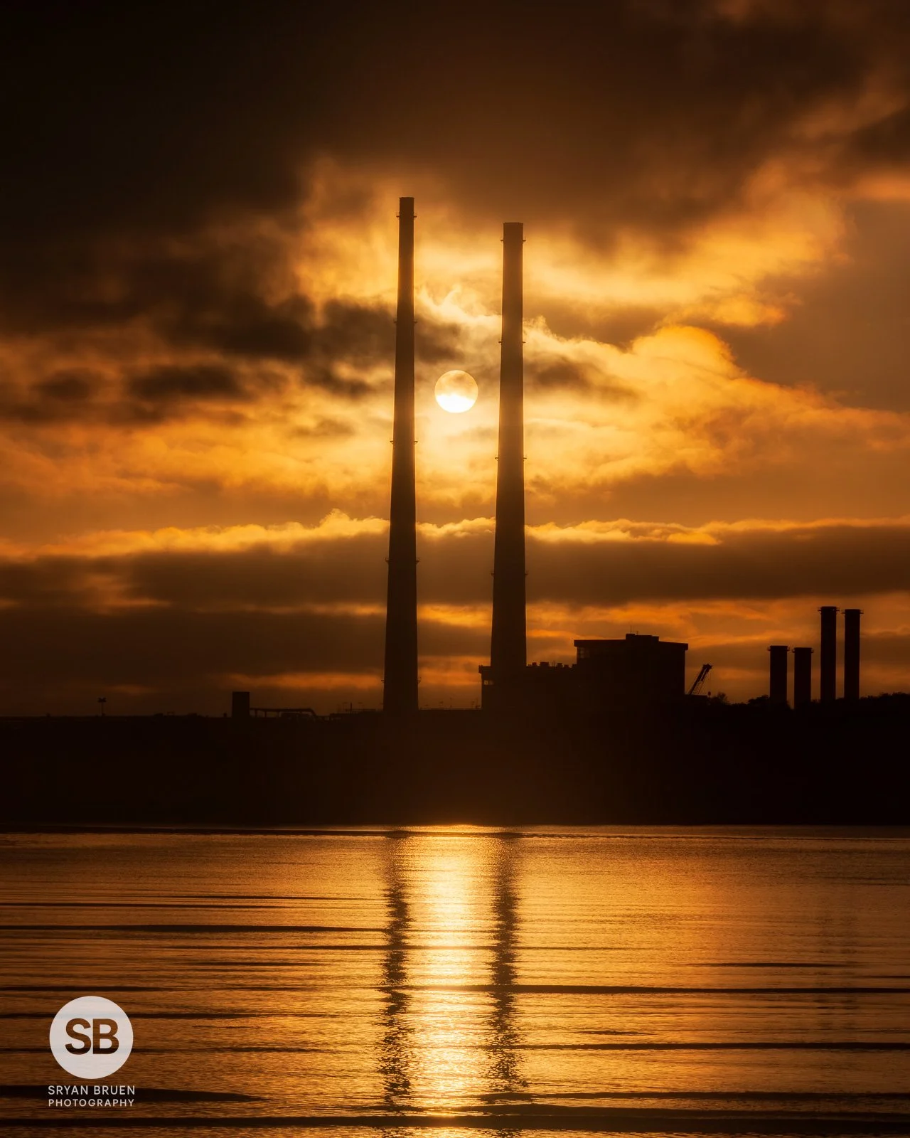 2026-05-23 Poolbeg Chimneys low cloud sunrise alignment.jpg
