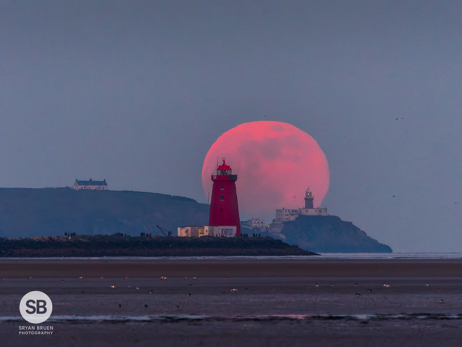 2024-02-24 Poolbeg and Baily Lighthouse moonrise 24 February 2024.jpg