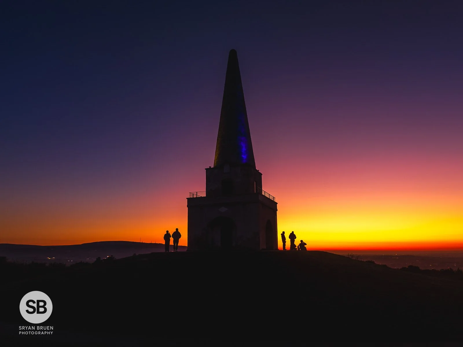 2025-04-06 Killiney Obelisk sunset afterglow silhouettes.jpg