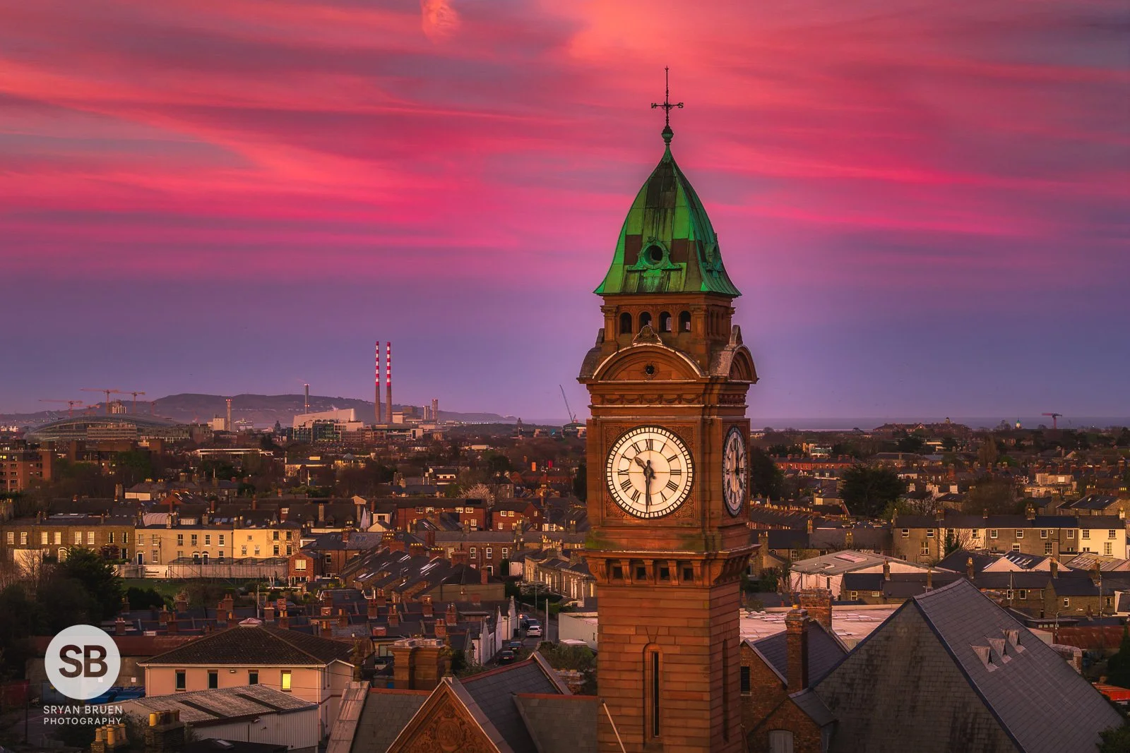 2025-03-31 Rathmines clock tower zoomed in Poolbeg sunset sky.jpg