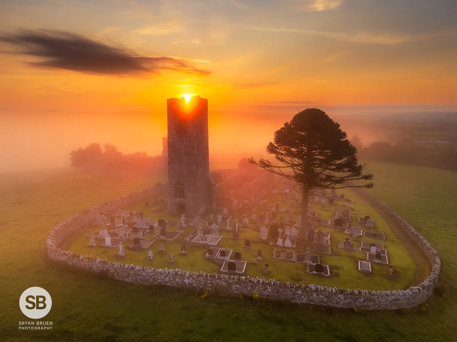 2024-07-28 Hill of Slane abbey ruins sunrise mist 28 July 2024.jpg