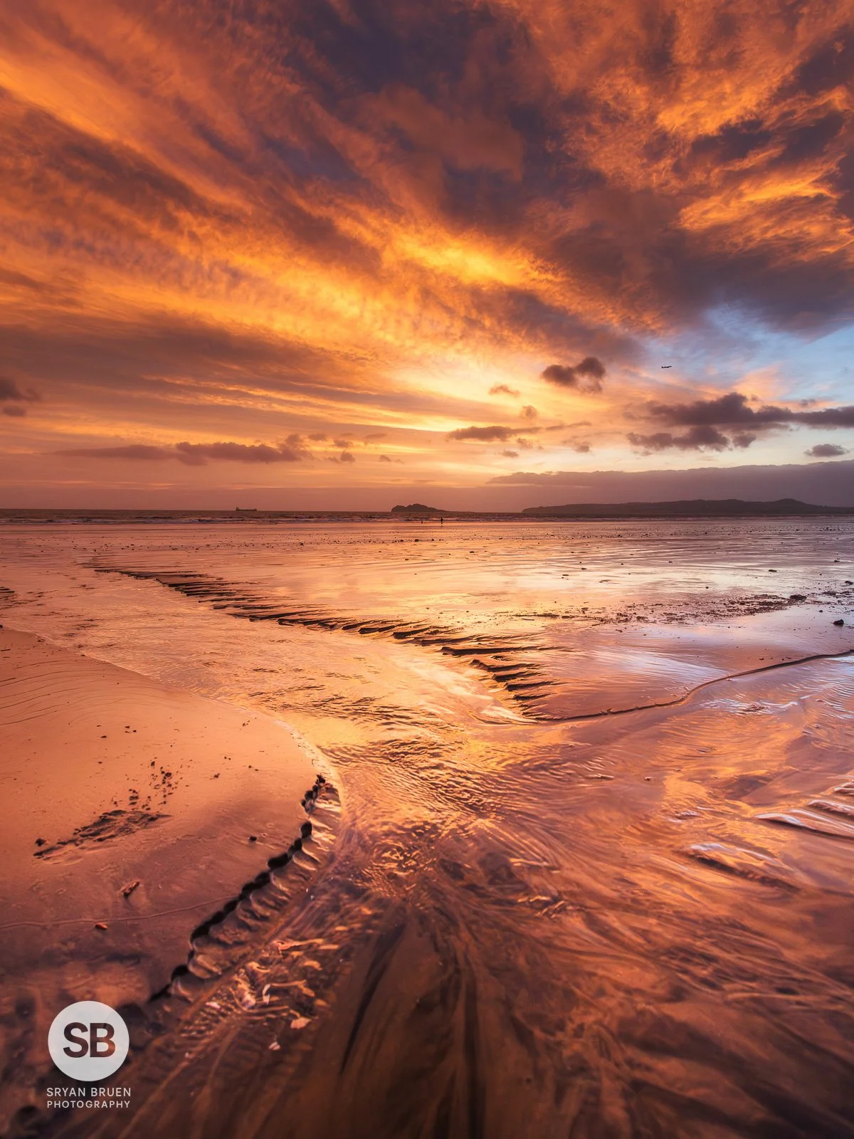 2025-12-11 Portmarnock fiery sky clouds sunrise.jpg