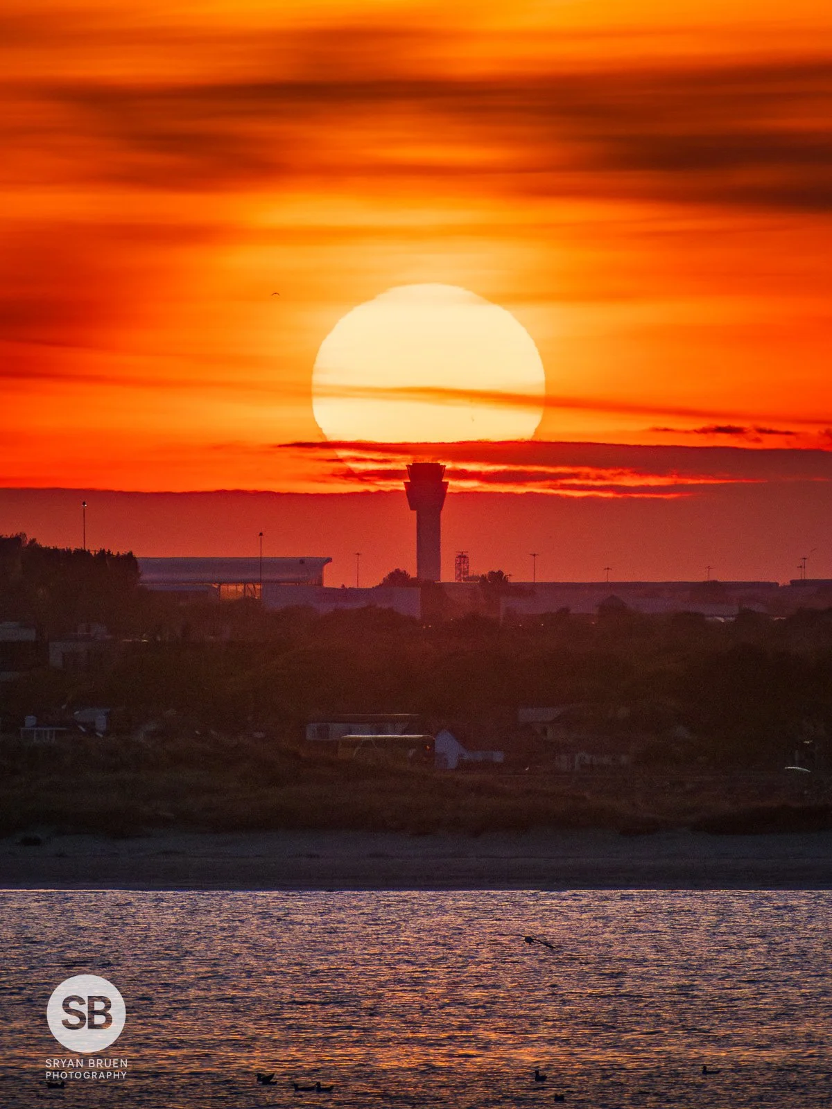 2025-05-06 Dublin Airport traffic control tower from Sutton sunset 6 May 2025.jpg