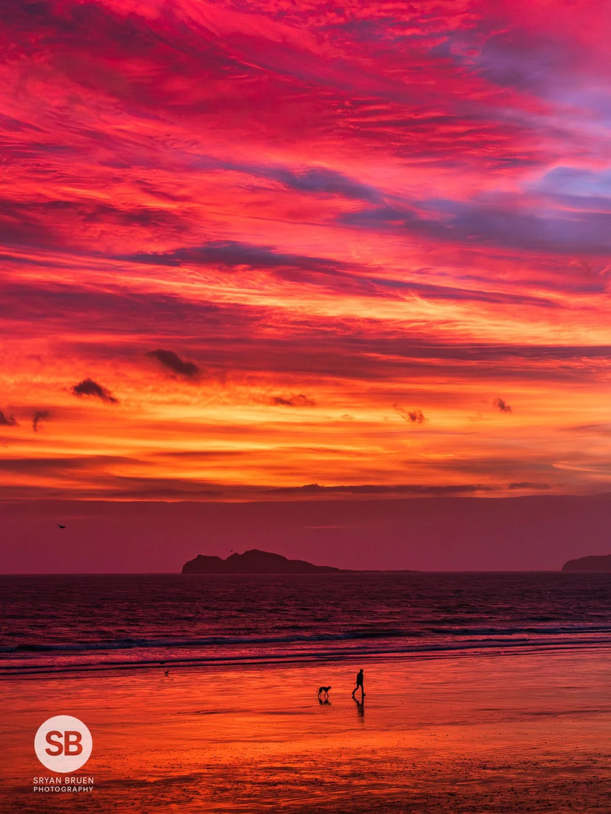 2025-12-11 Portmarnock Beach dog walker sunrise sky.jpg