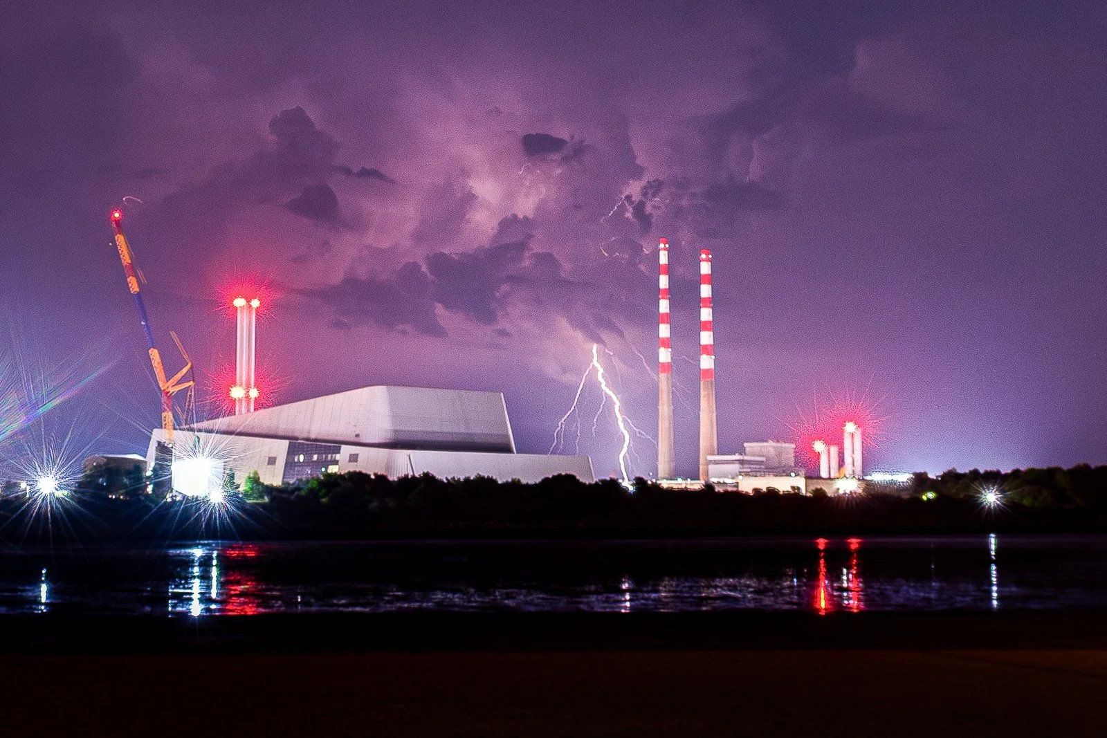 2026-05-28 Poolbeg lightning distant thunderstorm from Sandymount.jpg
