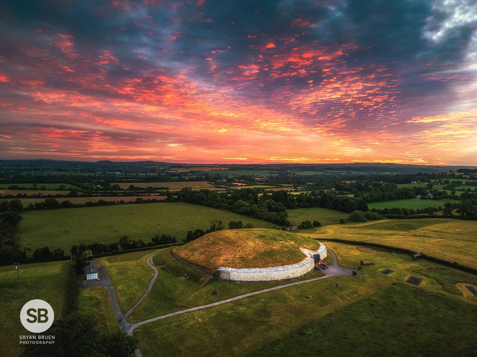 2024-06-20 Newgrange mythical sunrise sky.jpg