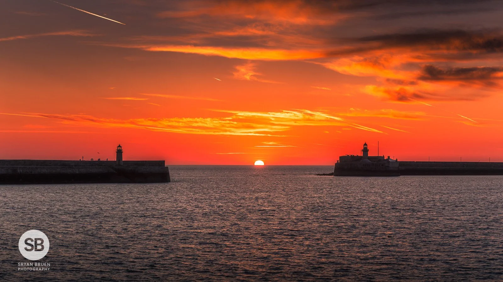 2025-04-01 Dun Laoghaire lighthouses sunrise 1 April 2025.jpg