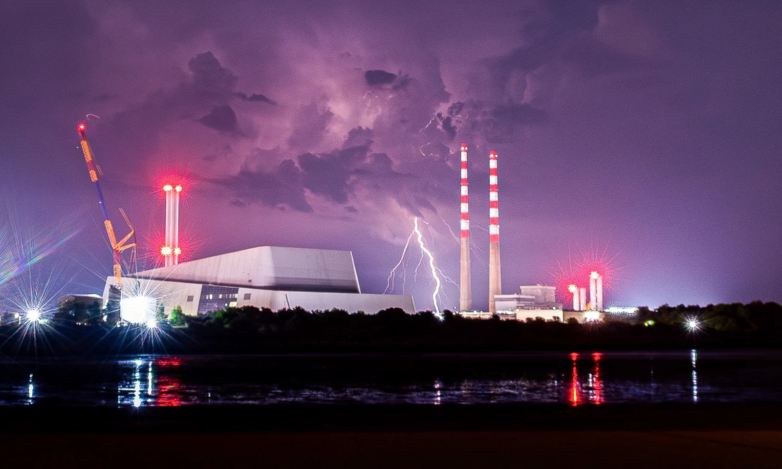 2026-05-28 Poolbeg lightning distant thunderstorm from Sandymount.jpg