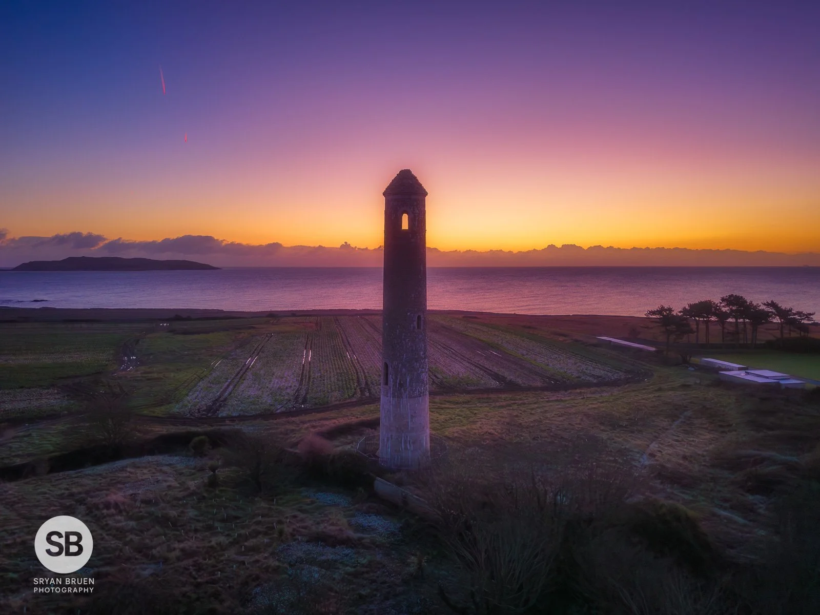 2026-01-03 Portrane Round Tower purple dawn sunrise.jpg