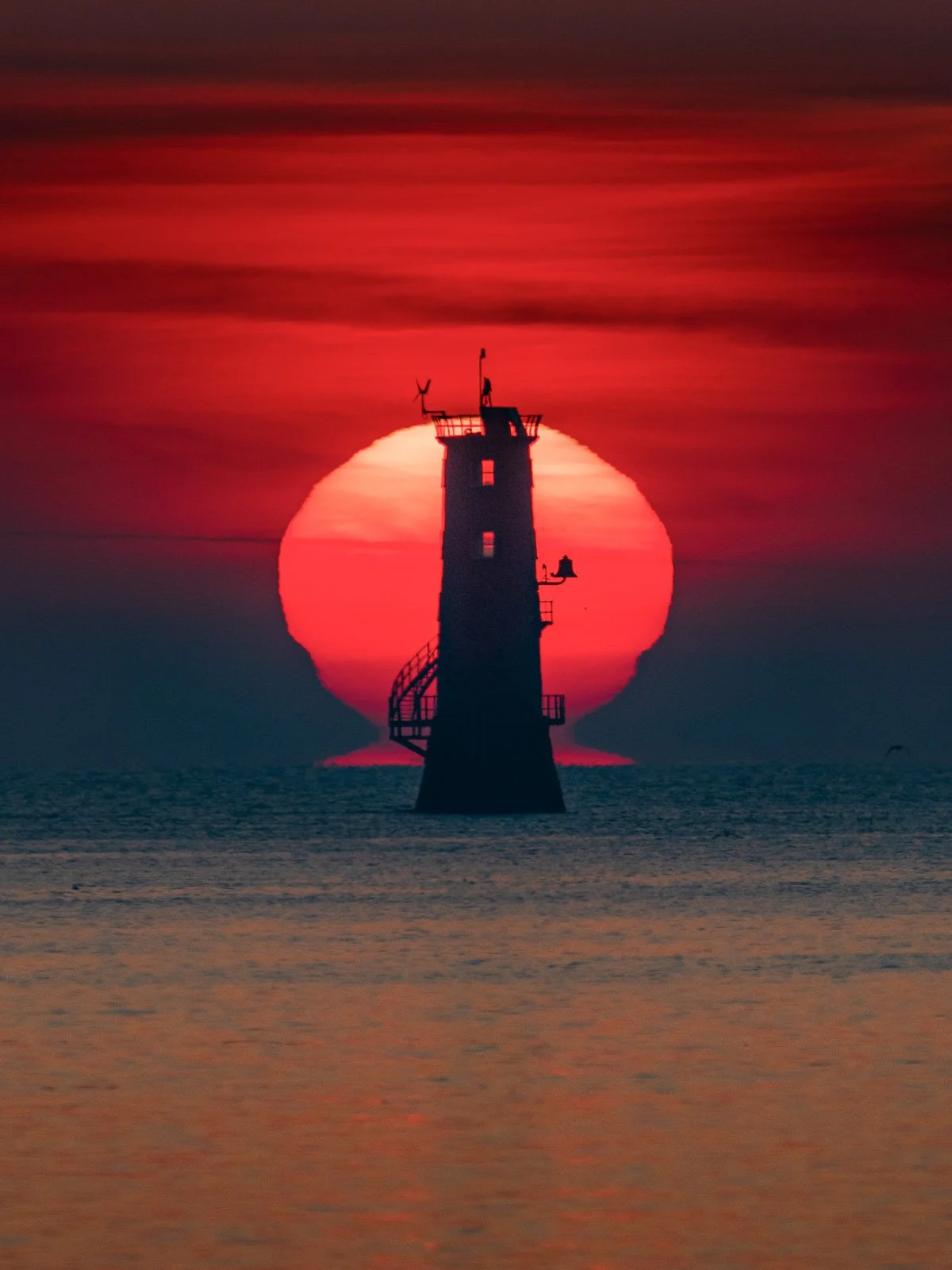 2025-04-10 North Bull Lighthouse sunrise mirage 10 April 2025.jpg