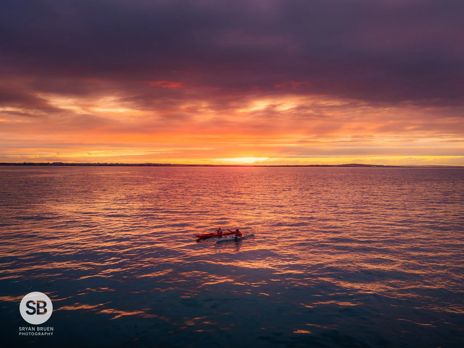 2026-07-29 Howth paddlers sunset sky.jpg