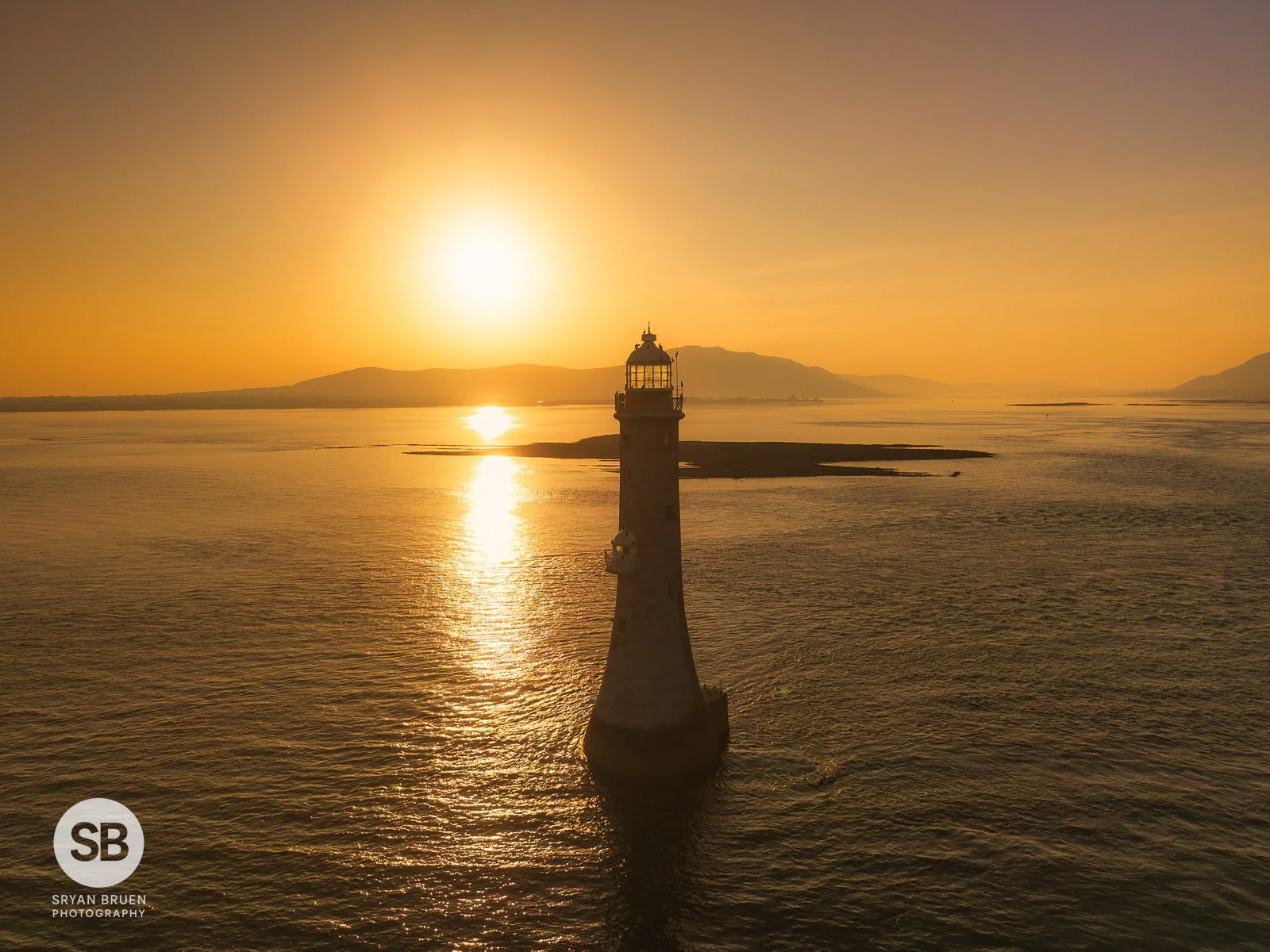 2025-04-10 Haulbowline Lighthouse sunset aerial 10 April 2025.jpg