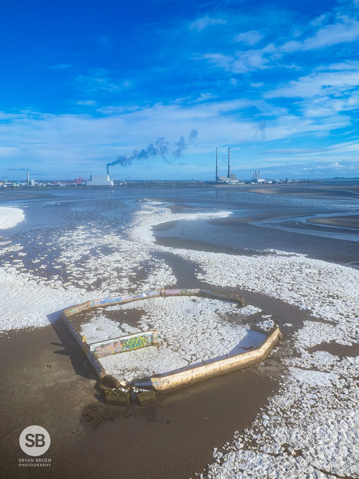 2024-03-02 Sandymount Baths snow with Poolbeg 2 March 2024.jpg