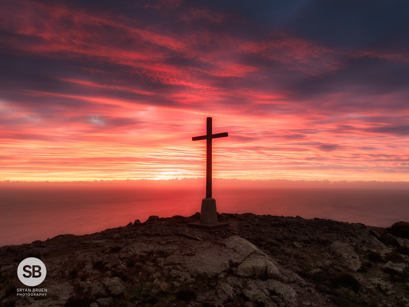 2026-03-26 Bray Head cross red fiery sunrise sky.jpg