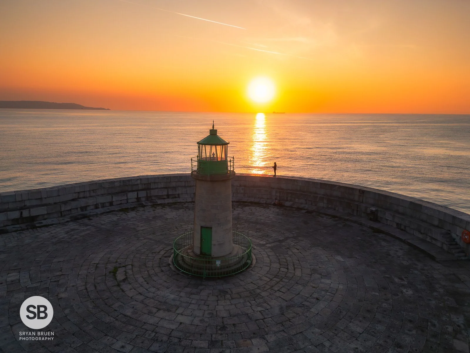 2024-07-31 Dun Laoghaire West Pier Lighthouse sunrise 31 July 2024.jpg