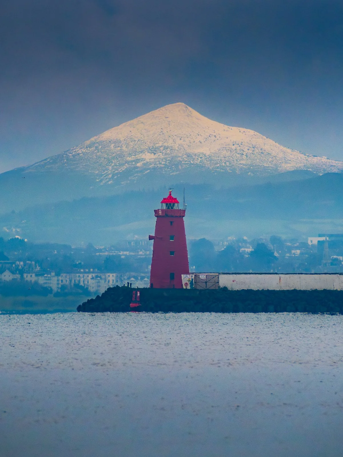 2025-01-08 Poolbeg Lighthouse Sugar Loaf snow 8 January 2025.jpg