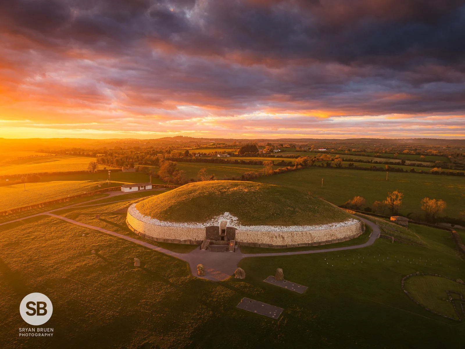 2025-03-11 Newgrange sunset side light 11 March 2025.jpg