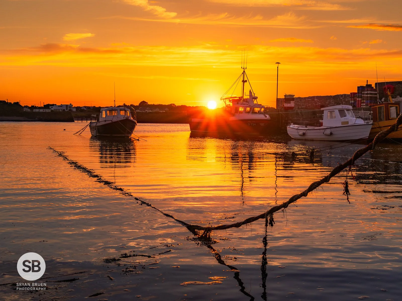2024-06-19 Rush Harbour towing cable sunset 19 June 2024.jpg