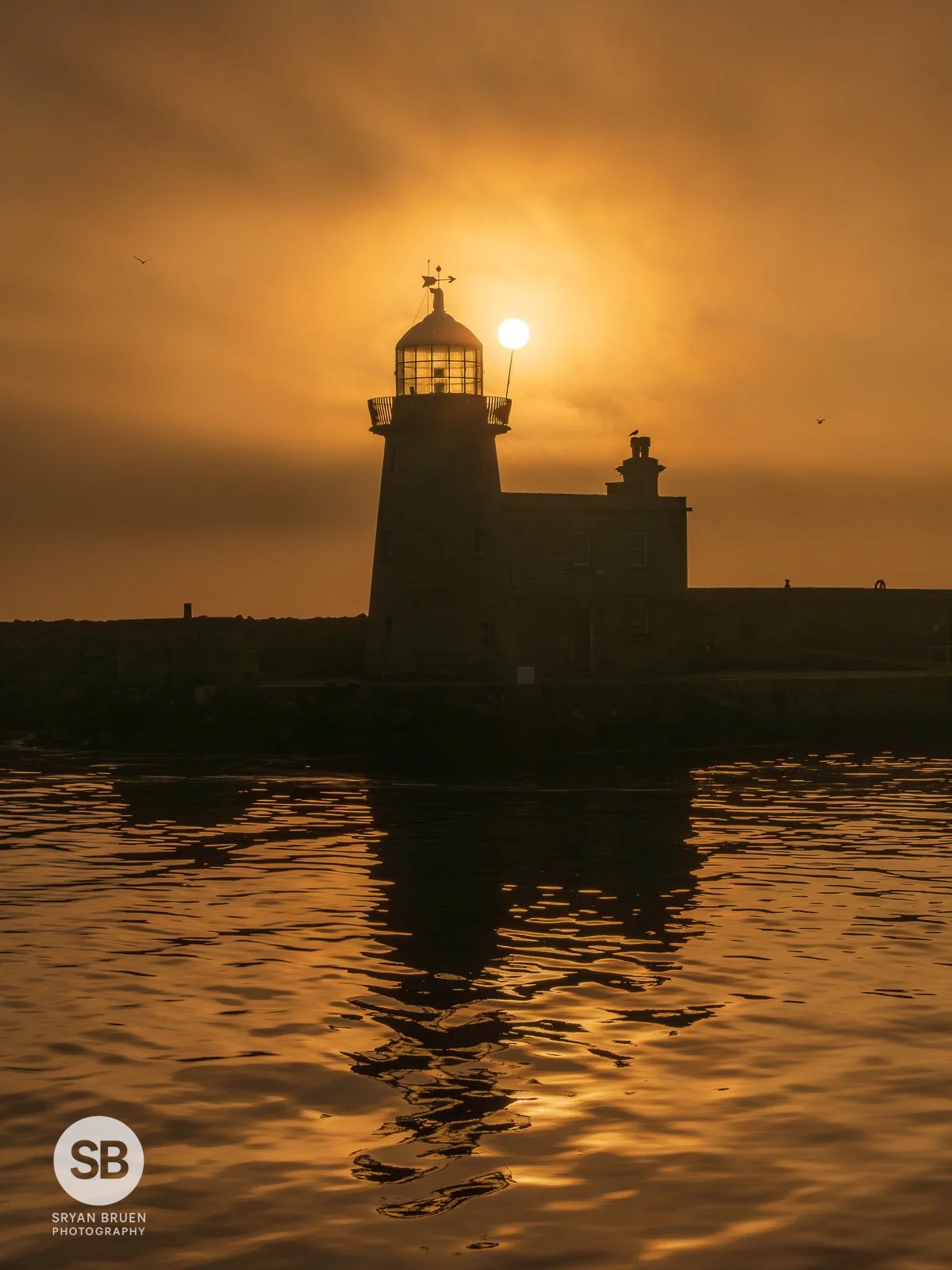 2024-05-16 Howth Lighthouse foggy sunrise 16 May 2024.jpg