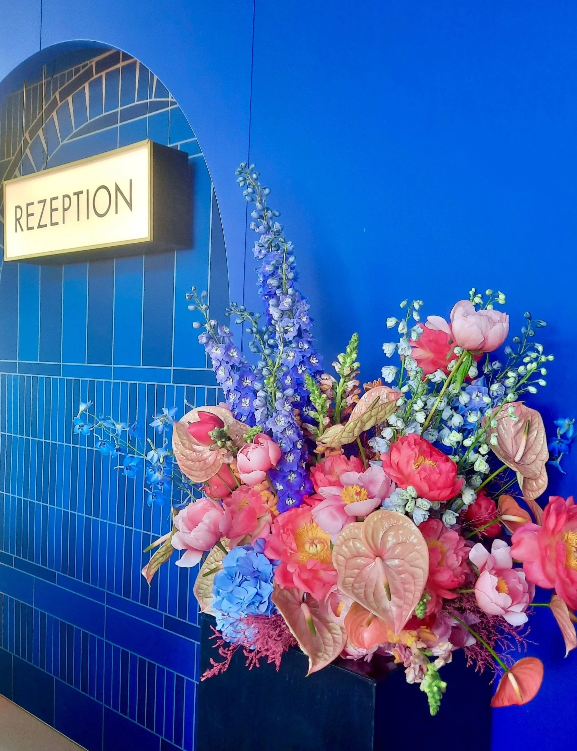 Floral installation with anthurium, delphinium and peonies at Formula E Berlin 2024 Rezeption, Tempelhofer Feld