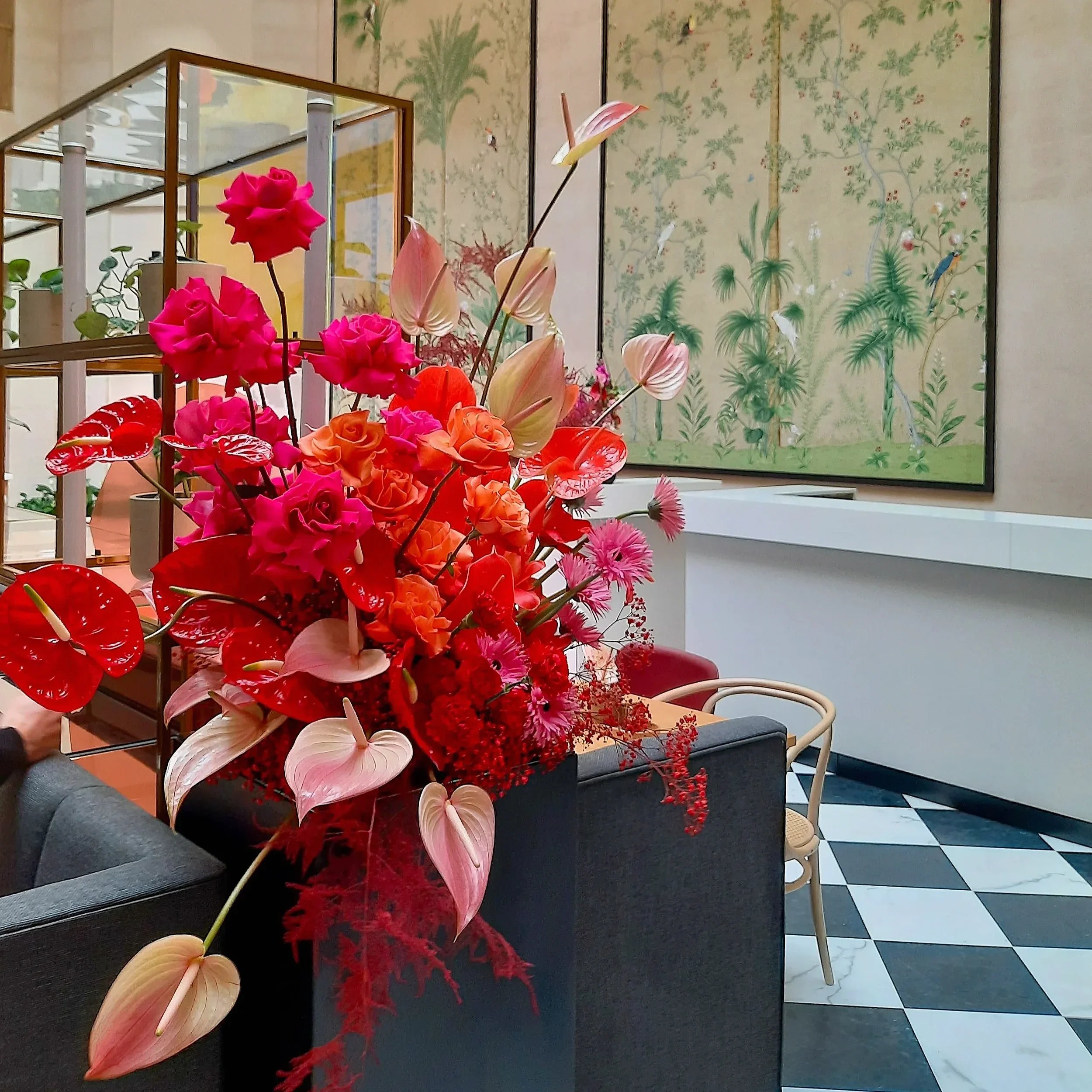 Luxury floral installation with anthurium, roses and tulips in Hotel Adlon Berlin lobby, Bundespresseball 2023