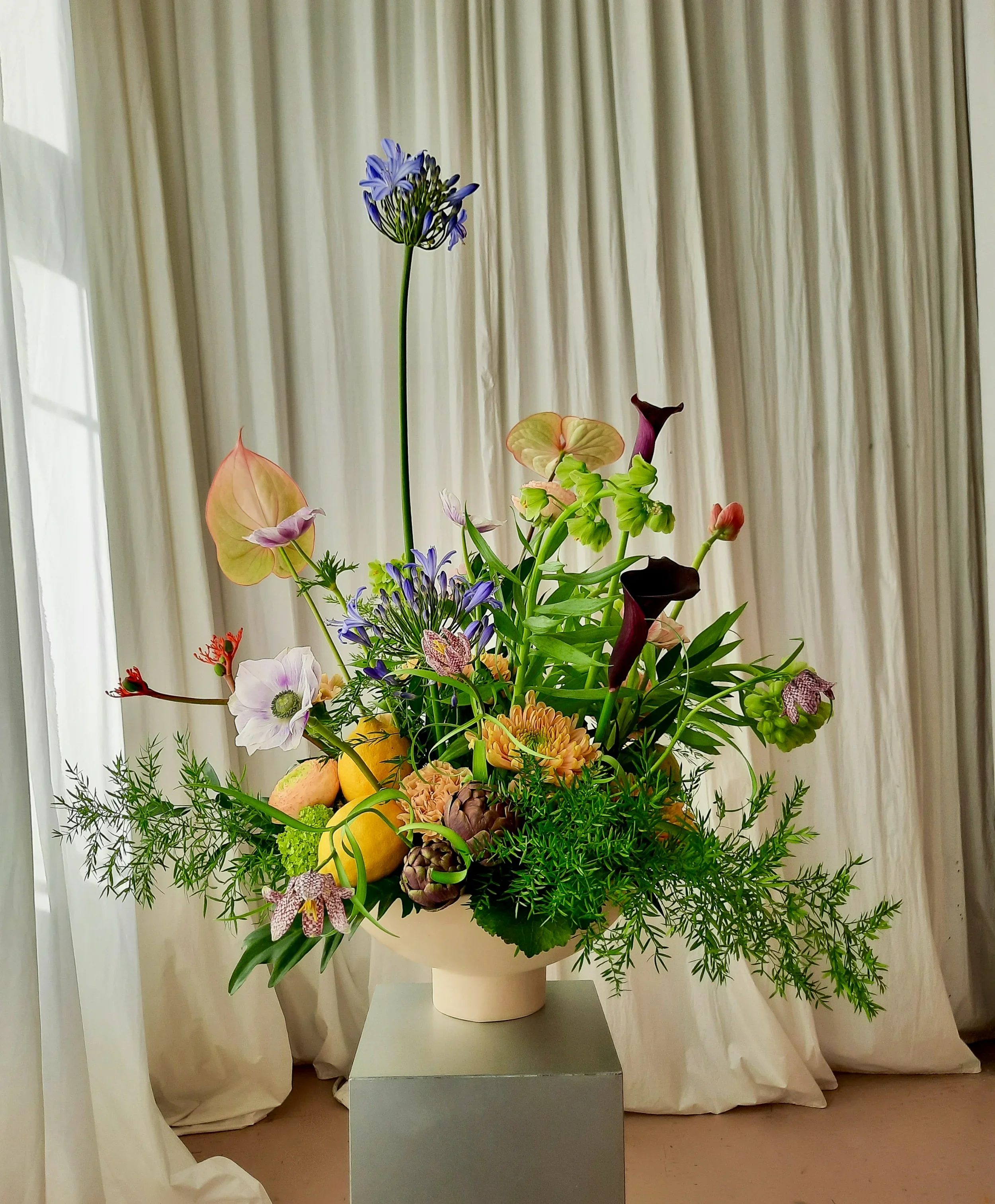 Floral installation with calla, fritillaria and ranunculus for Les Lunes photoshoot Berlin