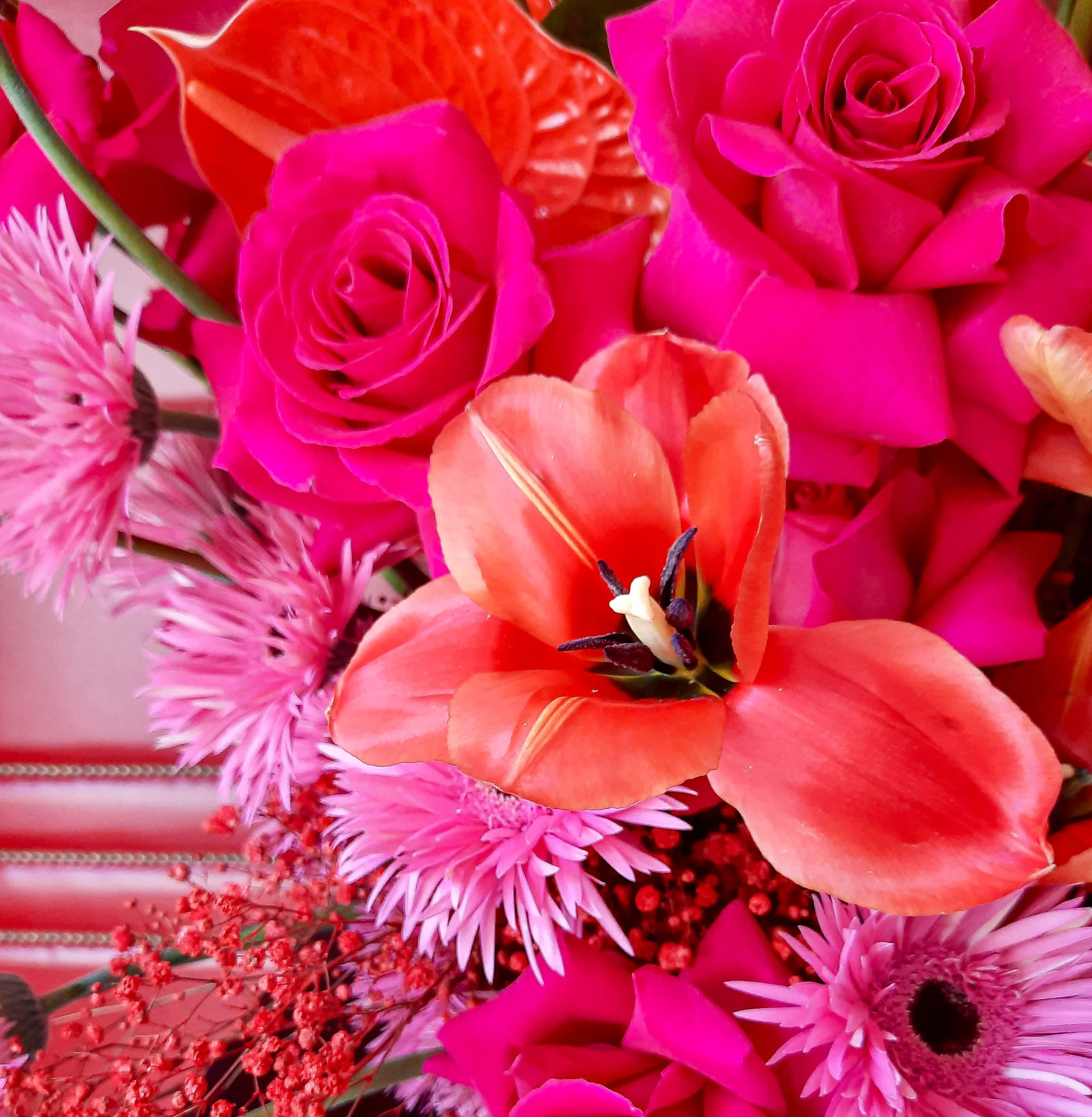 Close-up of luxury floral installation with red roses, anthurium, tulips and gerbera at Bundespresseball Berlin 2023