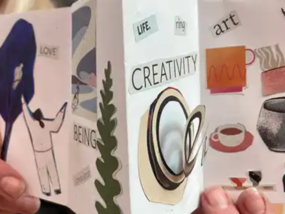 Close-up of an illustrated collage with words like 'LOVE', 'LIFE', 'CREATIVITY', and 'ART', and drawings including a person with a dog, a plant, and various abstract art items.