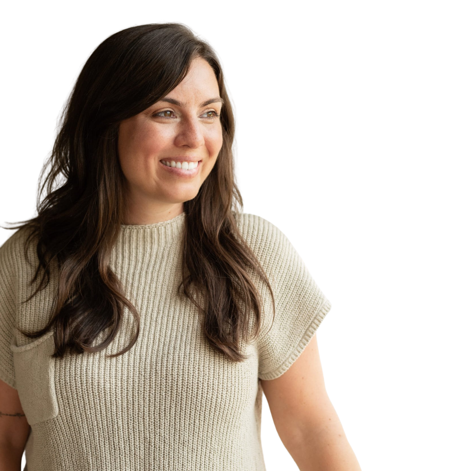 A woman with long brown hair and a light-colored short-sleeve sweater smiling, looking to the right.