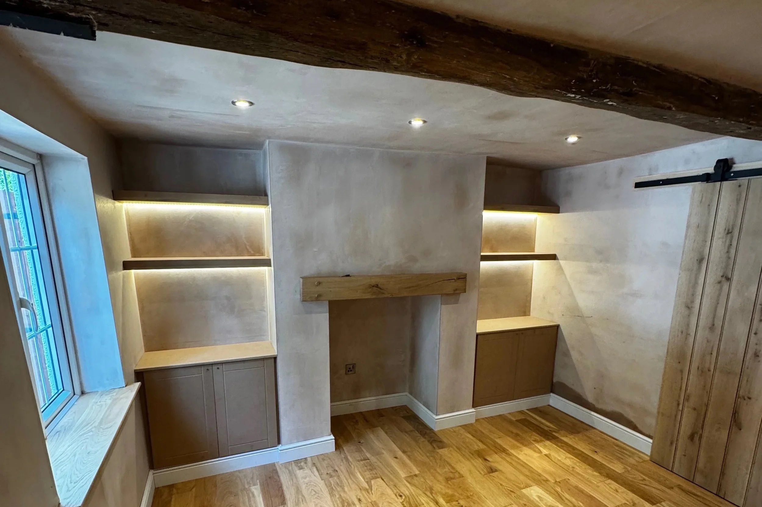 Remodelled and replastered living room, fireplace with oak mantle