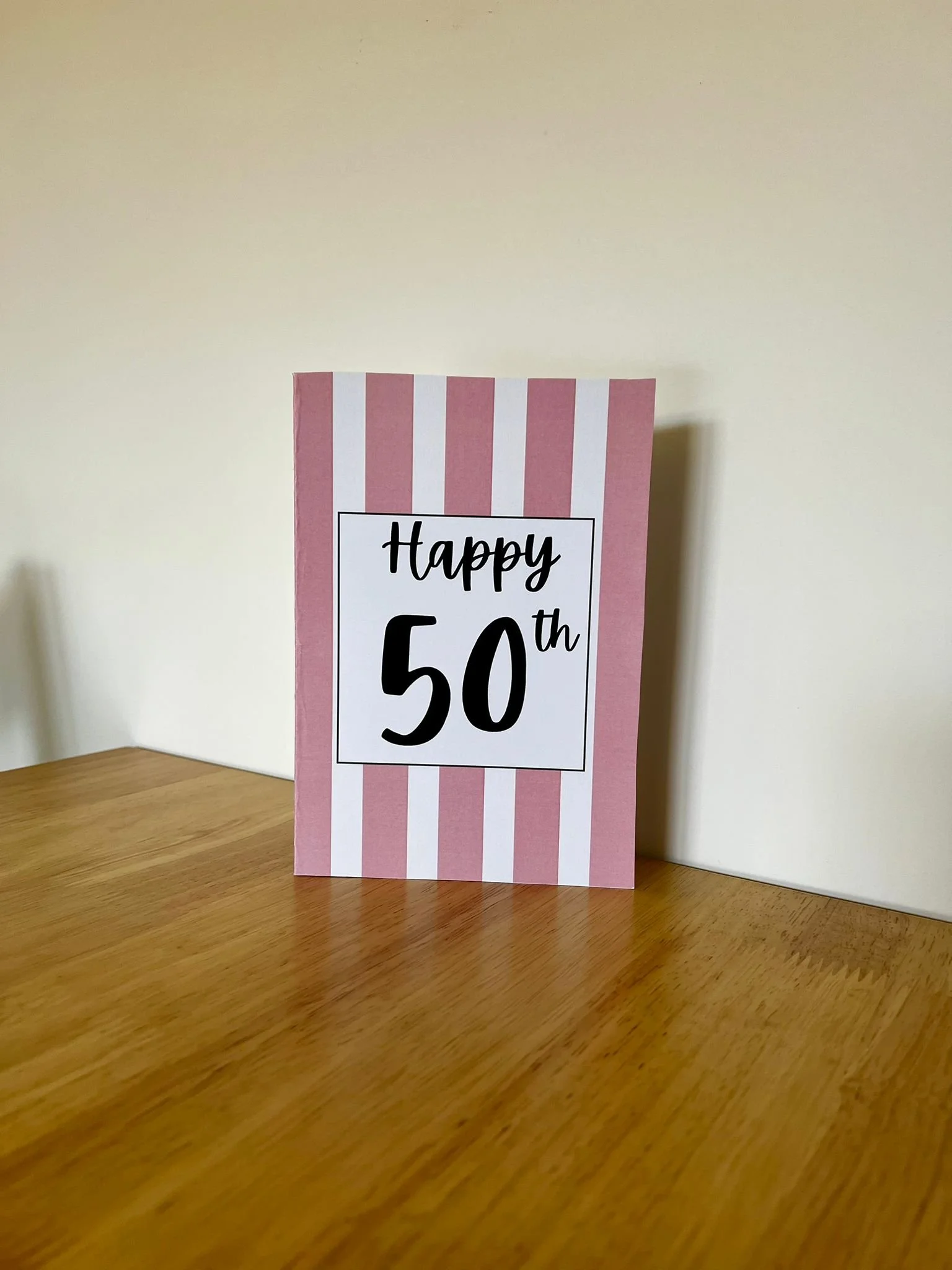 Happy 50 Pink Stand.jpeg