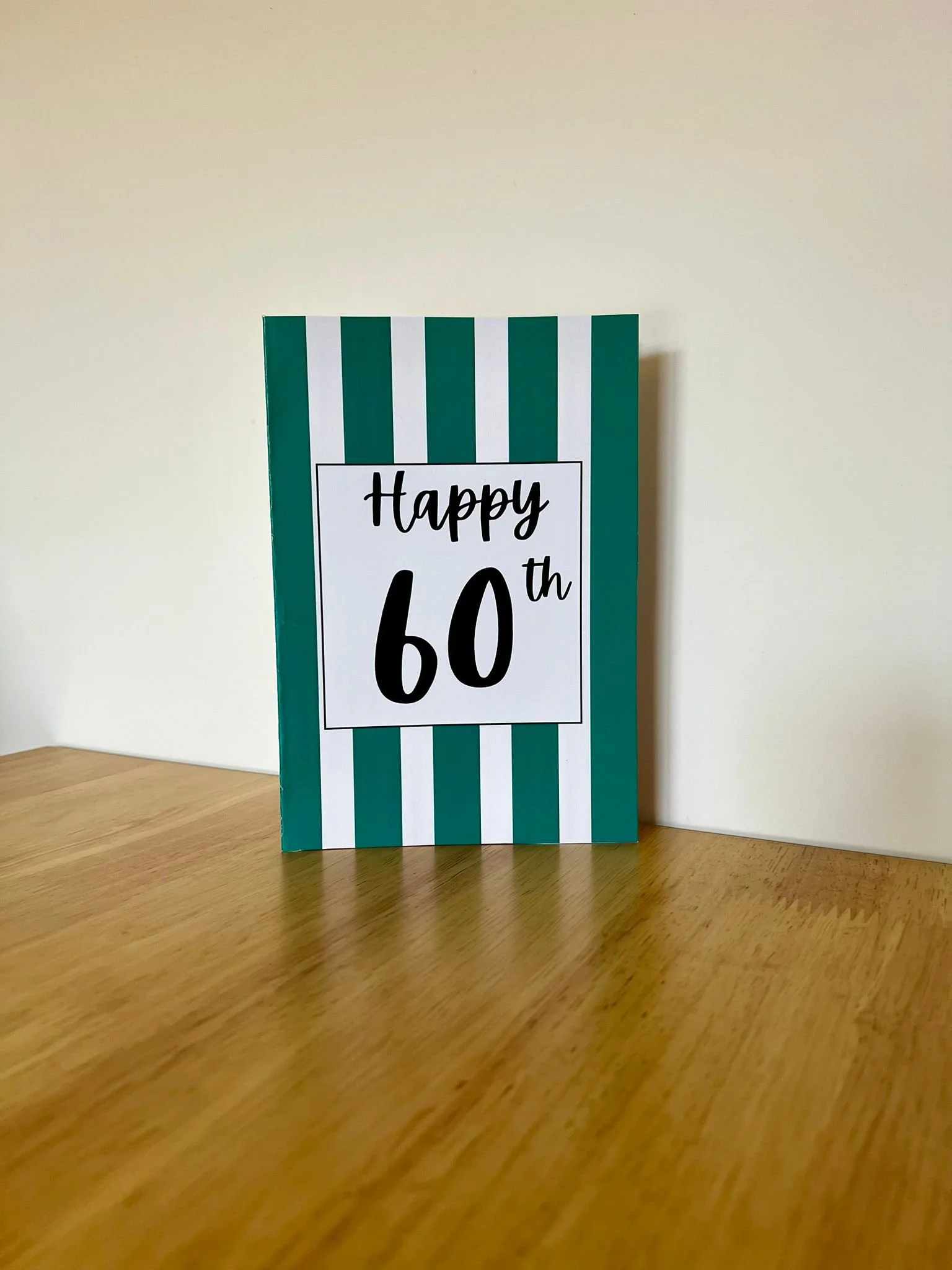 Happy 60 Green Stand.jpeg