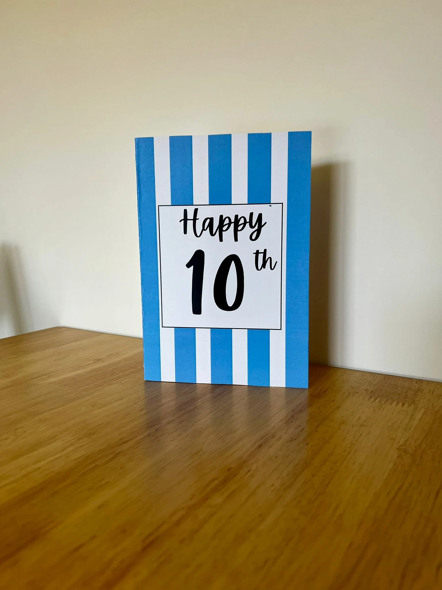 Happy 10 Blue Stand.jpeg