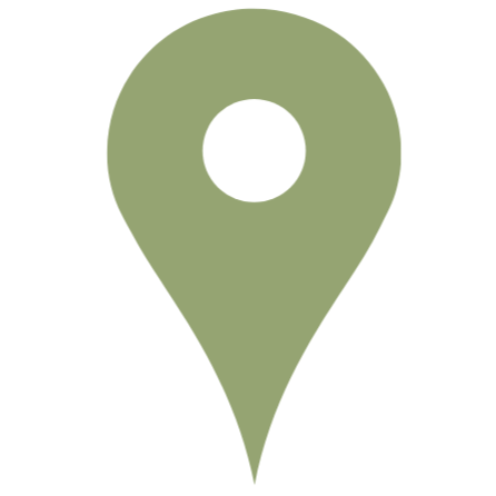 Green Google map pin icon with a white circle in the centre