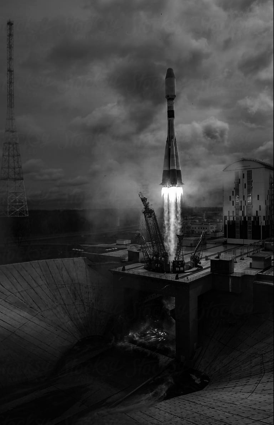 Black and white photo of a rocket launching from a space center.