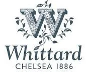 Whittard Chelsea 1886 logo with a large letter W and decorative floral design