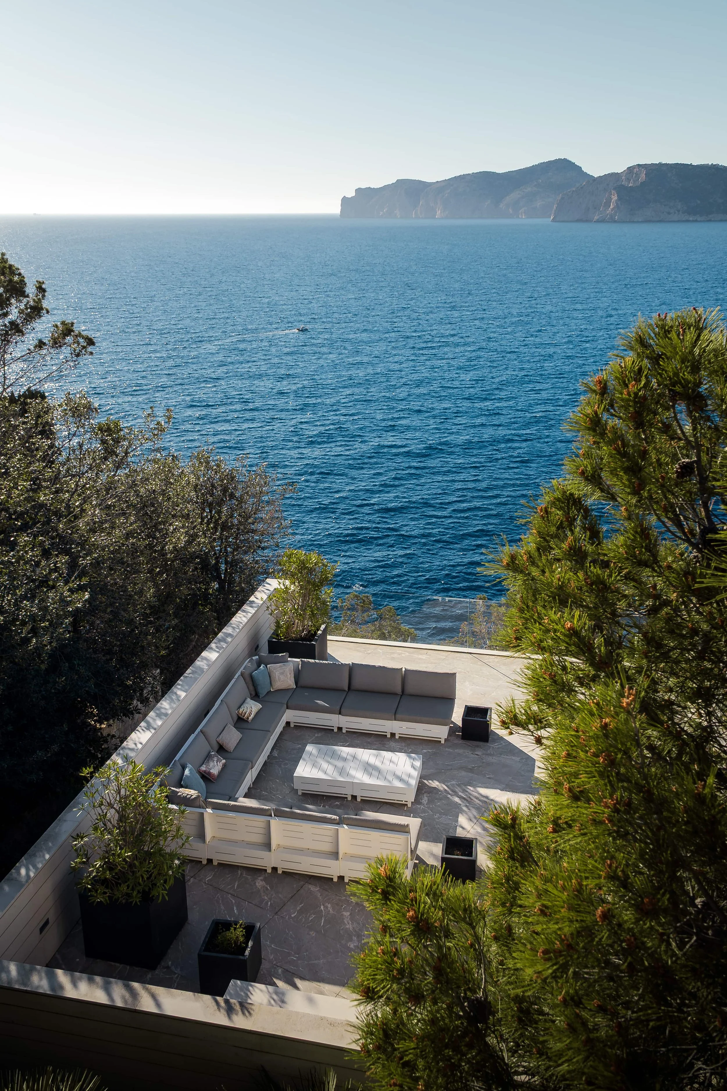 Contemporary villa exterior with cantilevered roof and sea views, southwest Mallorca