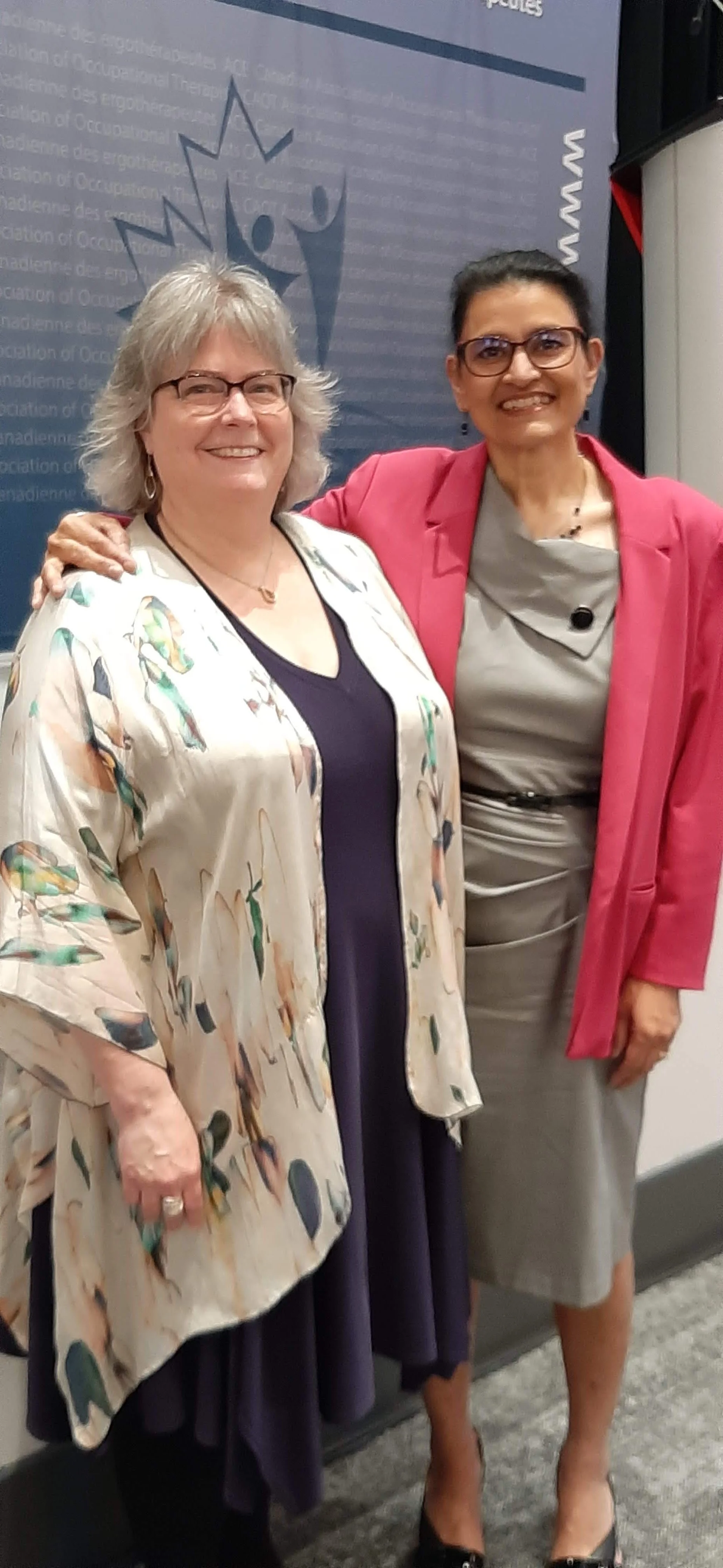 Catherine Backman and Sarabjeet Charchun present at the CAOT Conference, Whistler, BC, in 2022.
