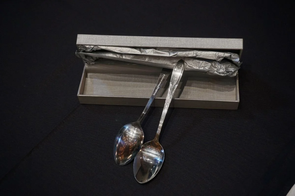 Silver spoons on auction at the Canadian Occupational Therapy Foundation fundraiser, CAOT Conference, Whistler, BC, in 2022. The annual COTF auction has long been a beloved conference tradition.