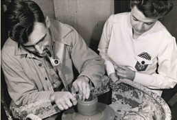 An OT works with a serviceman, subjects unknown.