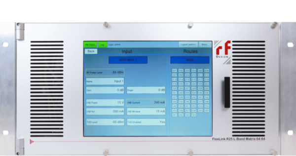 Electronic control panel with a blue touchscreen display showing input settings, route configurations, and technical data, mounted on a black background.