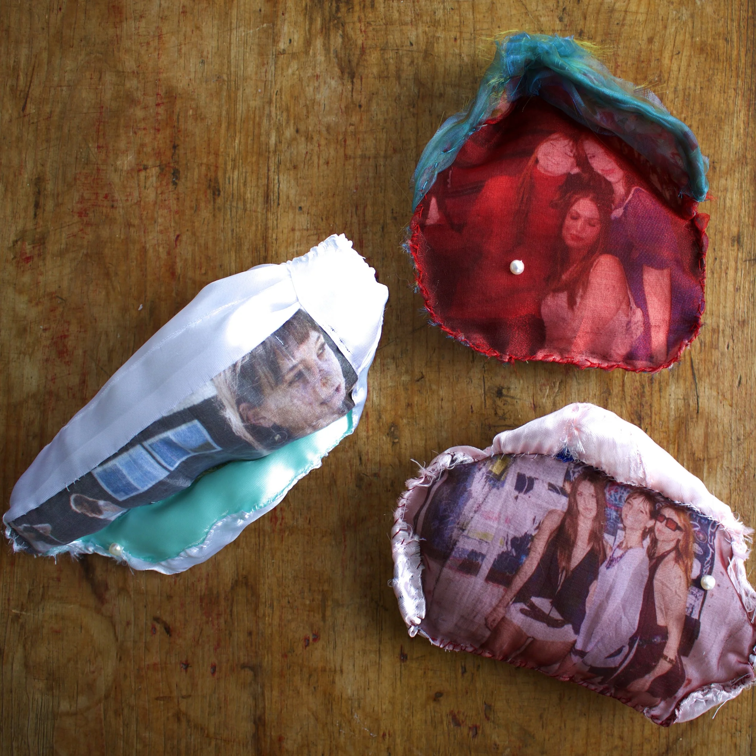 2025. "Three Friends." Organza, ribbon, inkjet printed cotton, thread and filling, freshwater pearls. Dimensions variable; all approximately 6 inches across maximum. Private Collection. 