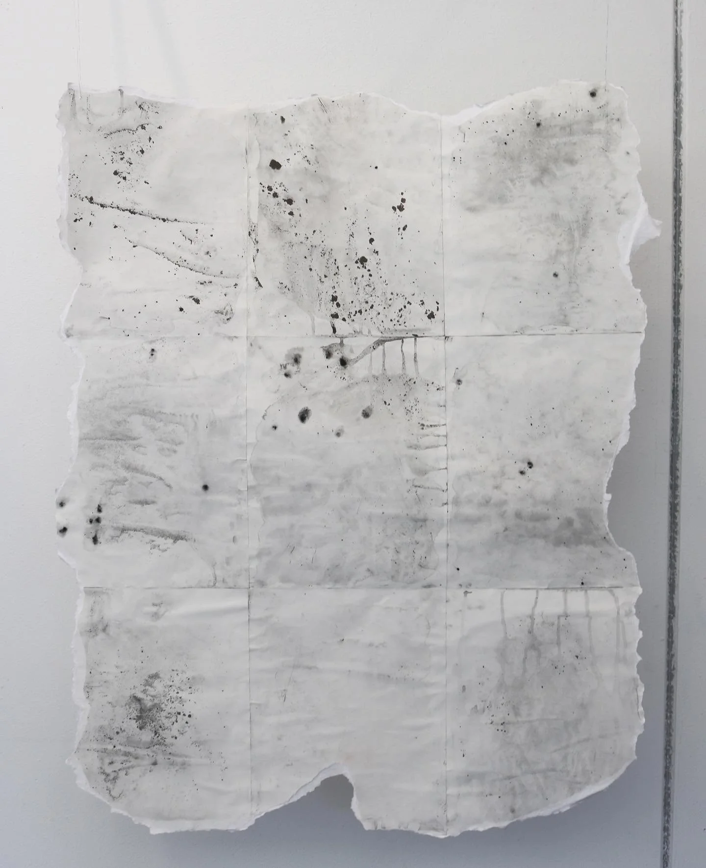 2021. Skin Quilts, 2/4. Paper, glue, charcoal, monofilament line. 36 x 40 inches.